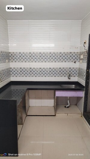 Kitchen in 1 BHK Apartment at Sun Elite, Ulwe – for Sale