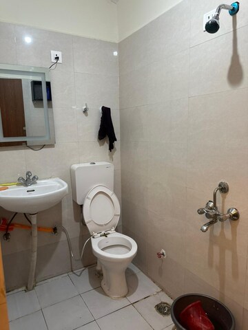 Bathroom in 3 BHK Apartment at Adore Happy Homes Grand, Sector 85 – for Rent
