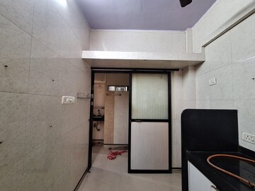 Kitchen in 2.5 BHK Apartment at Mansarovar CHS, Vashi Sector 14 – for Rent