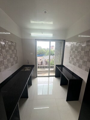 Kitchen in 1 BHK Apartment at Mauli Sai Chandra Pride, Khadakpada – for Sale