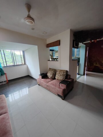 Living Room in 2 BHK Apartment at Vijay Nagari Annex, Waghbil – for Rent