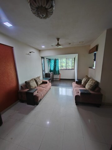 Living Room in 2 BHK Apartment at Vijay Nagari Annex, Waghbil – for Rent