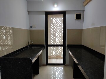 Kitchen in 2 BHK Apartment at Lodha Palava Downtown, Dombivli East – for Rent