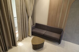 Living Room in 2 BHK Apartment at Sunteck West World, Tivri – for Sale