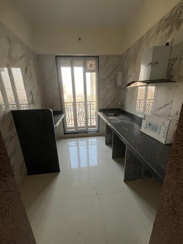 Kitchen in 2 BHK Apartment at Paradise Sai World Empire, Kharghar – for Rent