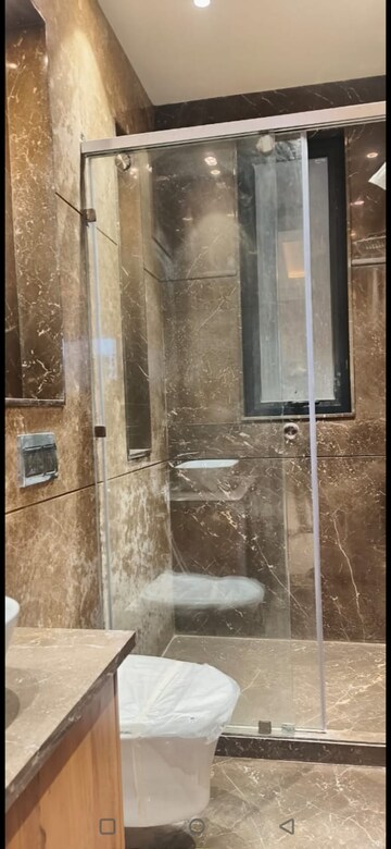 Bathroom in 3 BHK Apartment at Defence Colony – for Rent