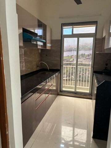 Kitchen in 2 BHK Apartment at Dombivli – for Sale