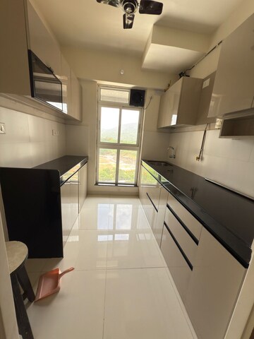 Kitchen in 1 BHK Apartment at Raunak Heights, Ghodbunder Road – for Rent