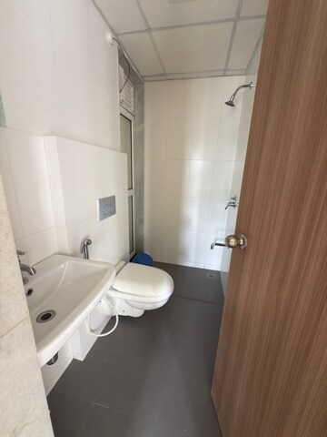 Bathroom in 1 BHK Apartment at Raunak Heights, Ghodbunder Road – for Rent