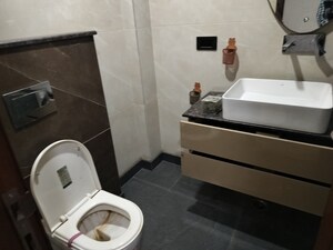 Bathroom in 3 BHK Builder Floor at Rajouri Garden – for Sale