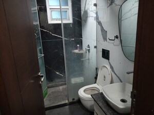 Bathroom in 3 BHK Builder Floor at Rajouri Garden – for Sale