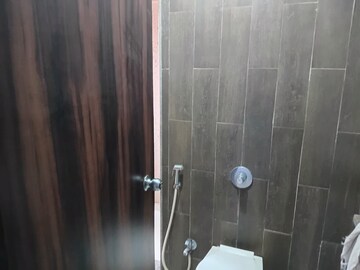 Bathroom in 1 BHK Apartment at Metropolis Rivera, Kasarvadavali – for Rent