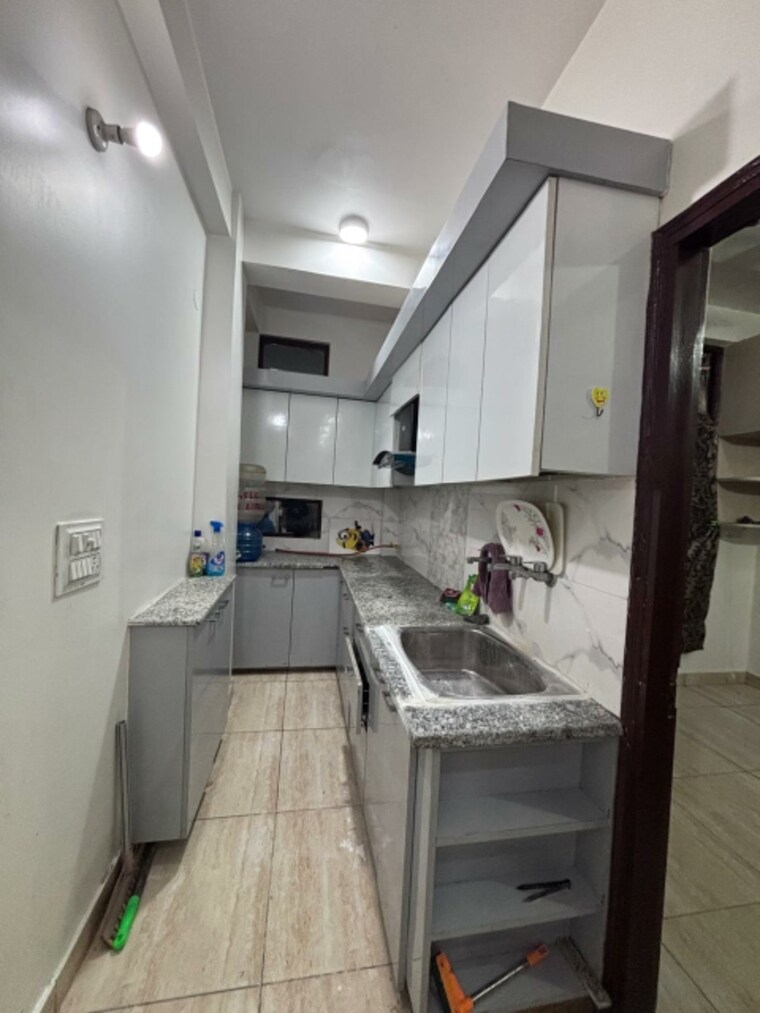 Kitchen, mansa ram park 2 Bedroom 55 Sq.Yd. Builder Floor In Mansa Ram Park Delhi 9074019