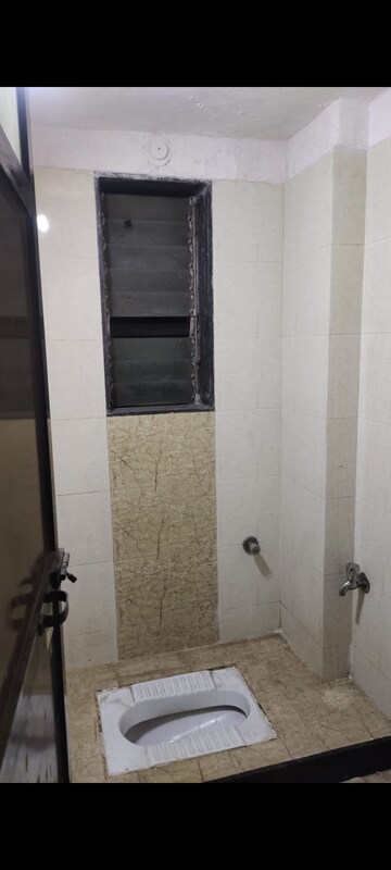 Bathroom in 1 BHK Apartment at Metro Paradise, Mulund West – for Sale