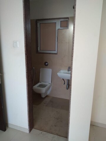 Bathroom in 2 BHK Apartment at Cosmos Jewels, Ghodbunder Road – for Rent