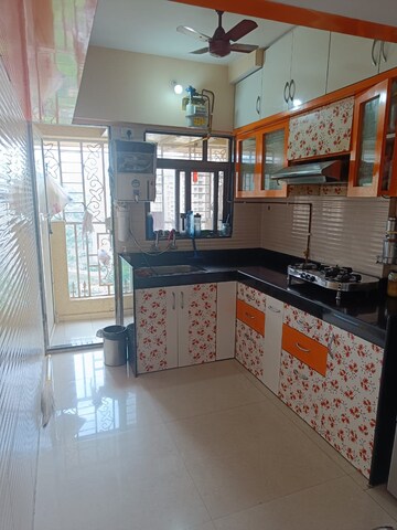 Kitchen in 2 BHK Apartment at Cosmos Jewels, Ghodbunder Road – for Rent