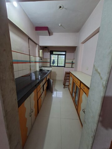 Kitchen in 1 BHK Apartment at Parimal Park CHS, Mulund East – for Rent