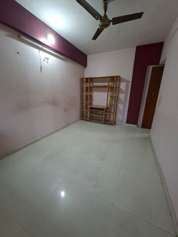 Bedroom in 1 BHK Apartment at Parimal Park CHS, Mulund East – for Rent