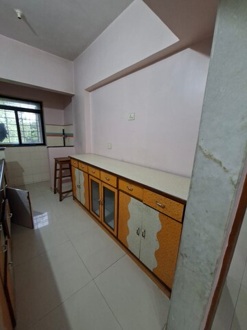 Kitchen in 1 BHK Apartment at Parimal Park CHS, Mulund East – for Rent
