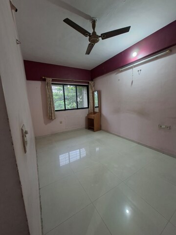 Bedroom in 1 BHK Apartment at Parimal Park CHS, Mulund East – for Rent