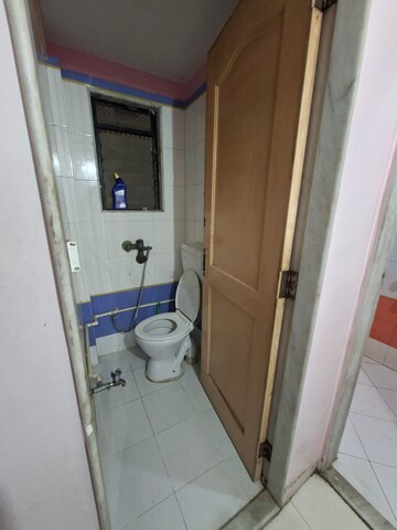 Bathroom in 1 BHK Apartment at Parimal Park CHS, Mulund East – for Rent
