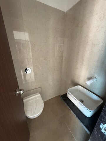 Bathroom in 1 BHK Apartment at TCJ Arya And Ira, Khadakpada – for Rent