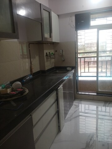 Kitchen in 1 BHK Apartment at RNA NG VIBRANCY, Mira Road – for Rent
