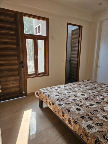 Bedroom in 2 BHK Builder Floor at Palm Residency Chhatarpur, Chattarpur – for Rent