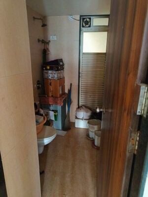 Bathroom in 2 BHK Apartment at Kopar Khairane – for Sale
