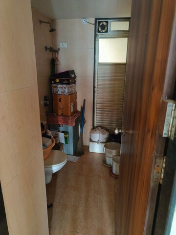 Bathroom in 2 BHK Apartment at Kopar Khairane – for Sale