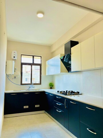Kitchen in 3 BHK Apartment at Ashiana Tarang, Sector 24 – for Sale