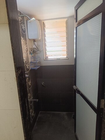 Bathroom in 1 BHK Apartment at Vakratunda Palace, Bhandup West – for Rent