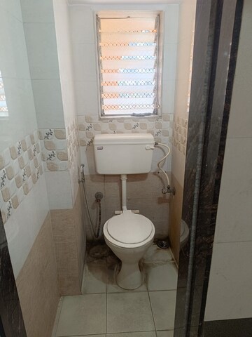 Bathroom in 1 BHK Apartment at Vakratunda Palace, Bhandup West – for Rent