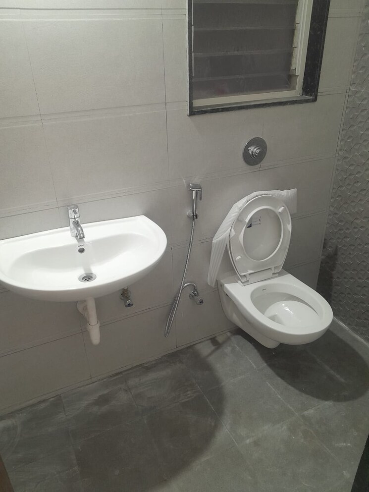 Bathroom, pride-world-city-kingsbury 2 Bedroom 697 Sq.Ft. Apartment In Charholi Budruk Pune 9074856