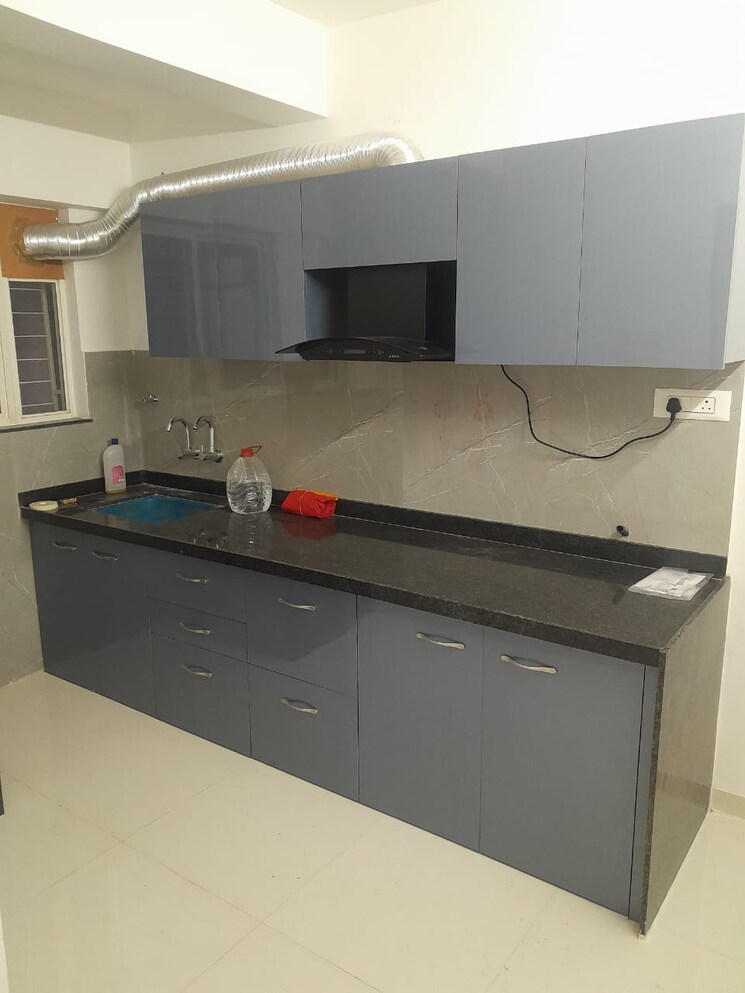 Kitchen, pride-world-city-kingsbury 2 Bedroom 697 Sq.Ft. Apartment In Charholi Budruk Pune 9074856