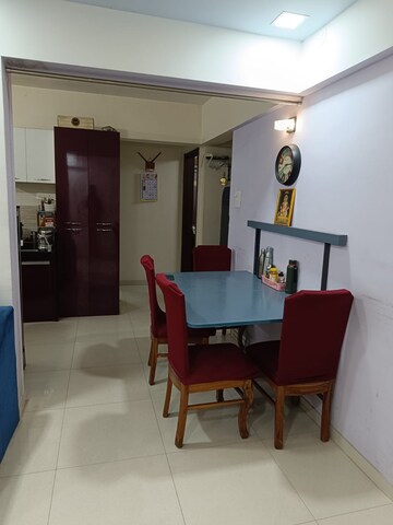 Living Room in 2 BHK Apartment at Charholi Budruk – for Rent