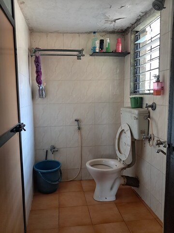 Bathroom in 1 BHK Apartment at Krishna Greenland Park Vastu Federation, Ghodbunder Road – for Rent