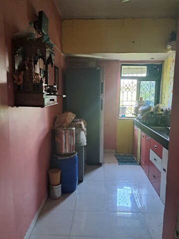 Kitchen in 1 BHK Apartment at Krishna Greenland Park Vastu Federation, Ghodbunder Road – for Rent