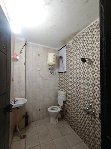 Bathroom in 1 BHK Apartment at Freedom Fighters Enclave – for Rent