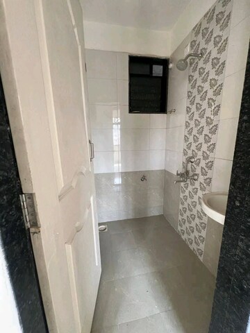 Bathroom in 2 BHK Apartment at Poonam Palash, Nalasopara West – for Sale