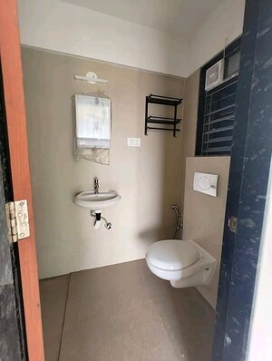 Bathroom in 2 BHK Apartment at Poonam Palash, Nalasopara West – for Sale