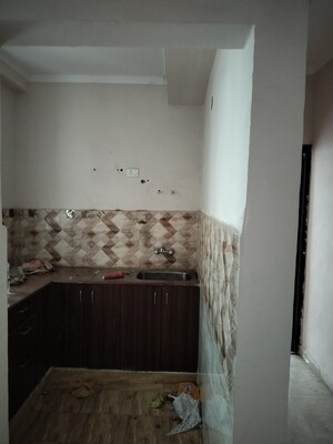 Kitchen in 2.5 BHK Apartment at Amrapali Golf Homes, Sector 4 Greater Noida – for Sale