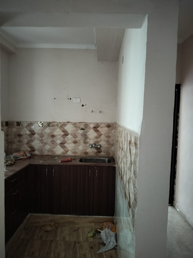 Kitchen, amrapali-golf-homes 2.5 Bedroom 945 Sq.Ft. Apartment In Sector 4 Greater Noida Greater Noida 9075174