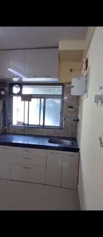 Kitchen in 2 BHK Apartment at Siddharth Nagar CHS Goregaon, Goregaon West – for Rent