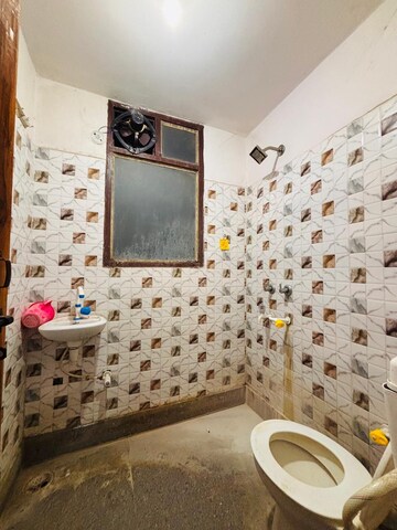Bathroom in 1 BHK Apartment at Freedom Fighters Enclave – for Rent