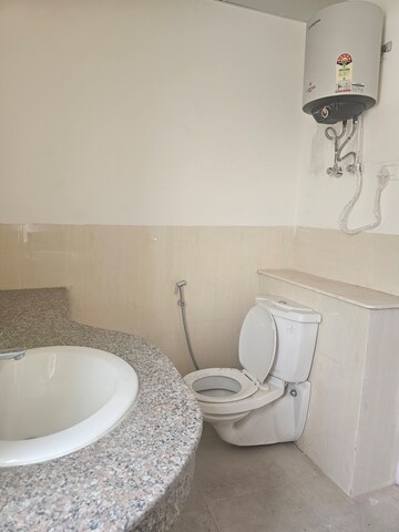 Bathroom in 3 BHK Apartment at Jaypee Greens Pavilion Court, Sector 128 – for Sale