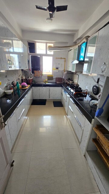 Kitchen in 3 BHK Apartment at Eldeco Riviera, Pi Greater Noida – for Sale