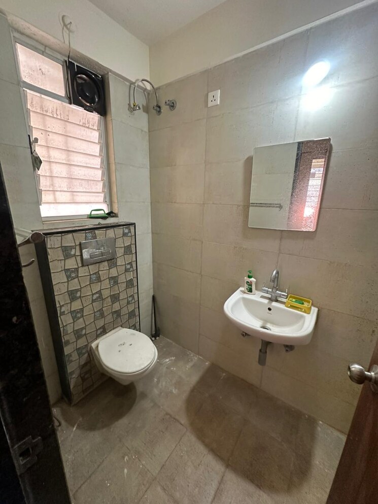 Bathroom, divine-reves 2 Bedroom 860 Sq.Ft. Apartment In Wakad Pune 9075466