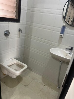 Bathroom in 2 BHK Apartment at Riverdale Tower, Andheri East – for Sale