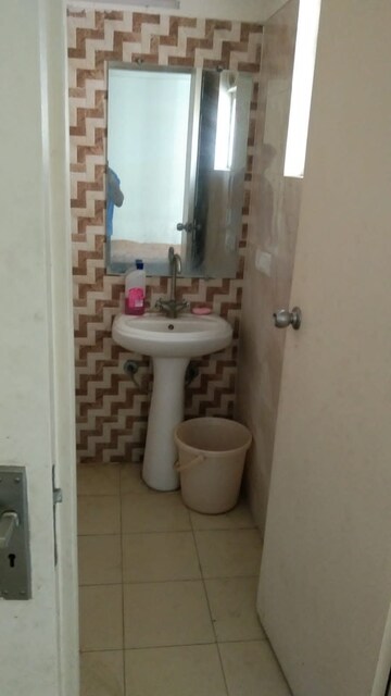 Bathroom in 2.5 BHK Apartment at Mahagun Mywoods, Sector 16c Greater Noida – for Rent
